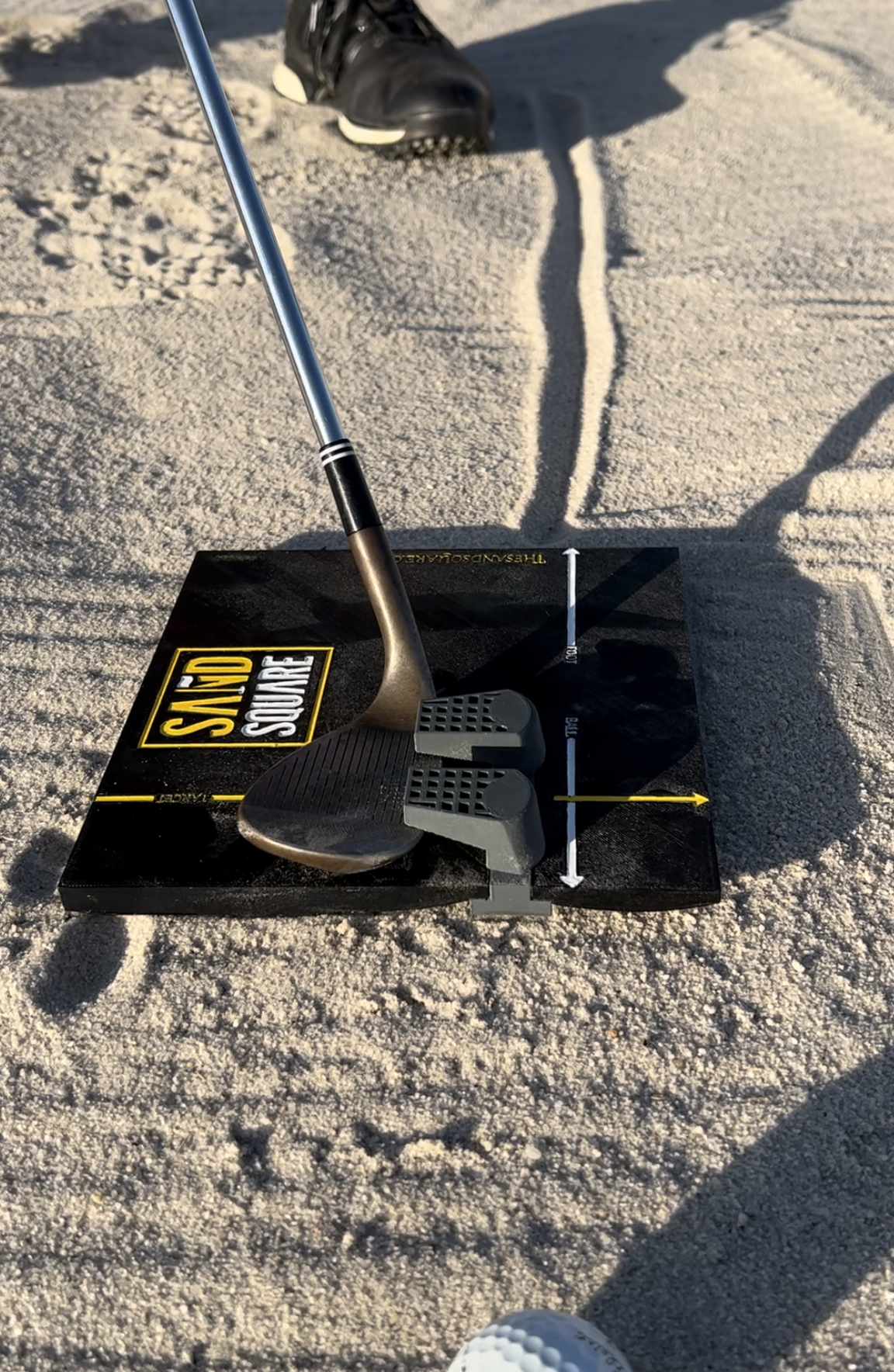 Where is the ball position for the sand shot? Sand shot can be played off of your lead foot.